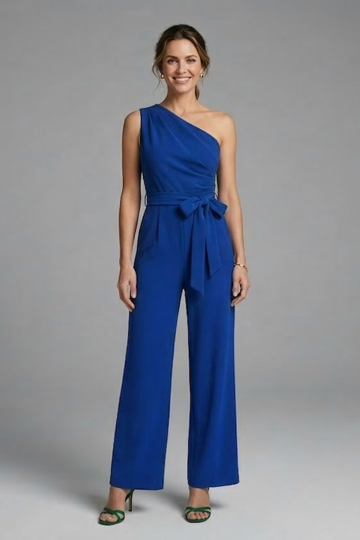 Stylish occasion wear women's jumpsuit; asymmetric neck, wide leg, and a sophisticated self-tie waist belt.