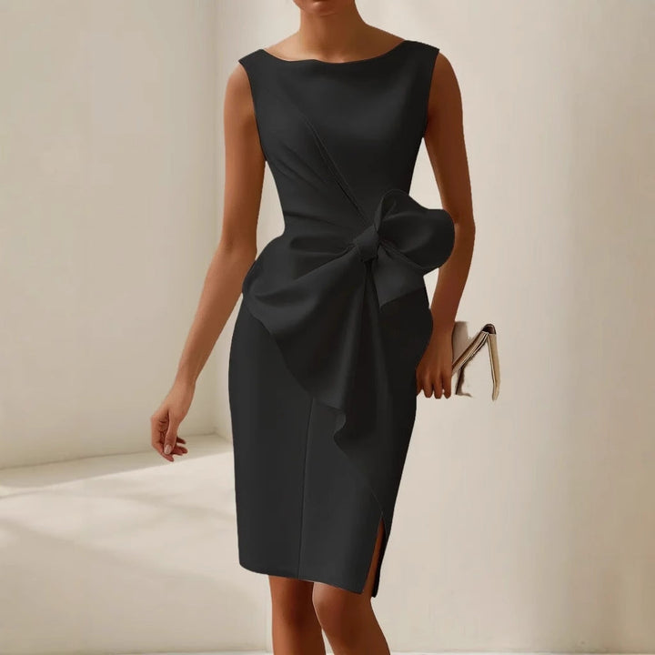 Stunning elegant sleeveless women's dress with an asymmetric hemline and exquisite bow detail for a special occasion.