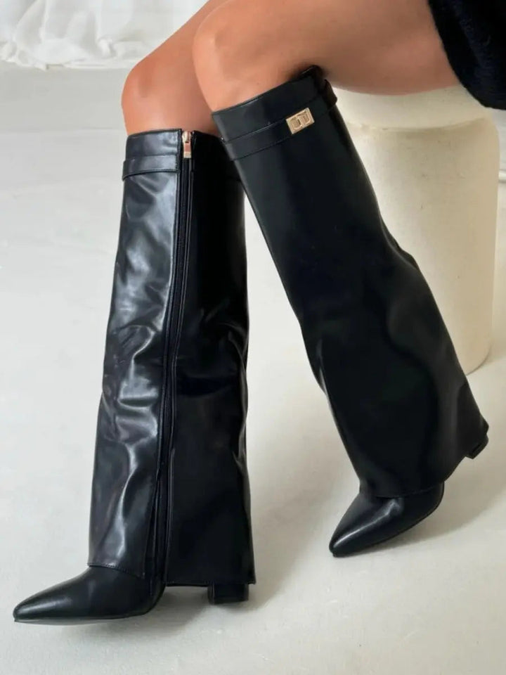 Brown elegant knee-high boots for women, boasting a pointed toe and a sleek wedge heel.