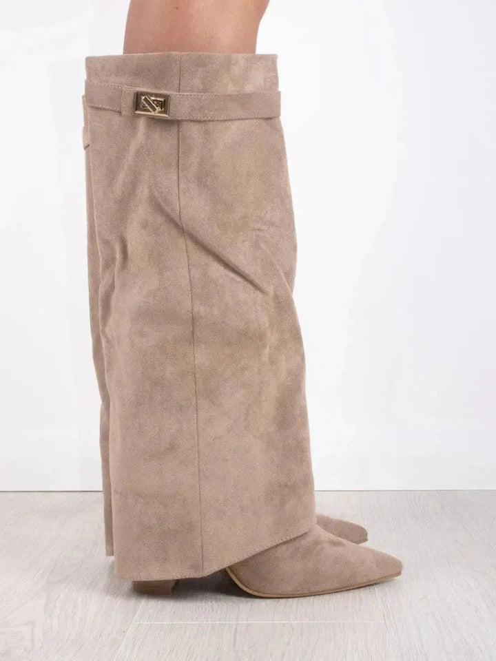 Women's fall fashion boots: elegant black knee-high with pointed toe and fashionable wedge heel.