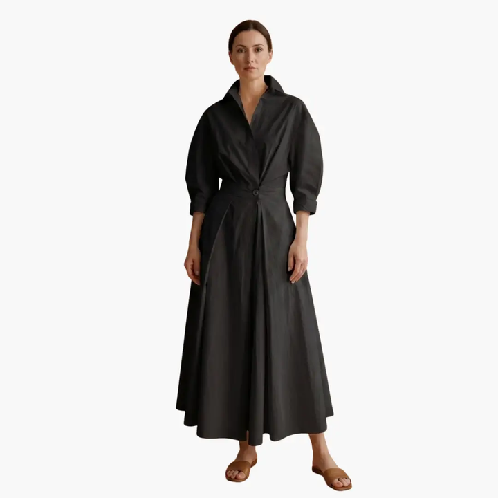Refined women's button-front shirt dress with a defined waist, offering an elegant and tailored silhouette.