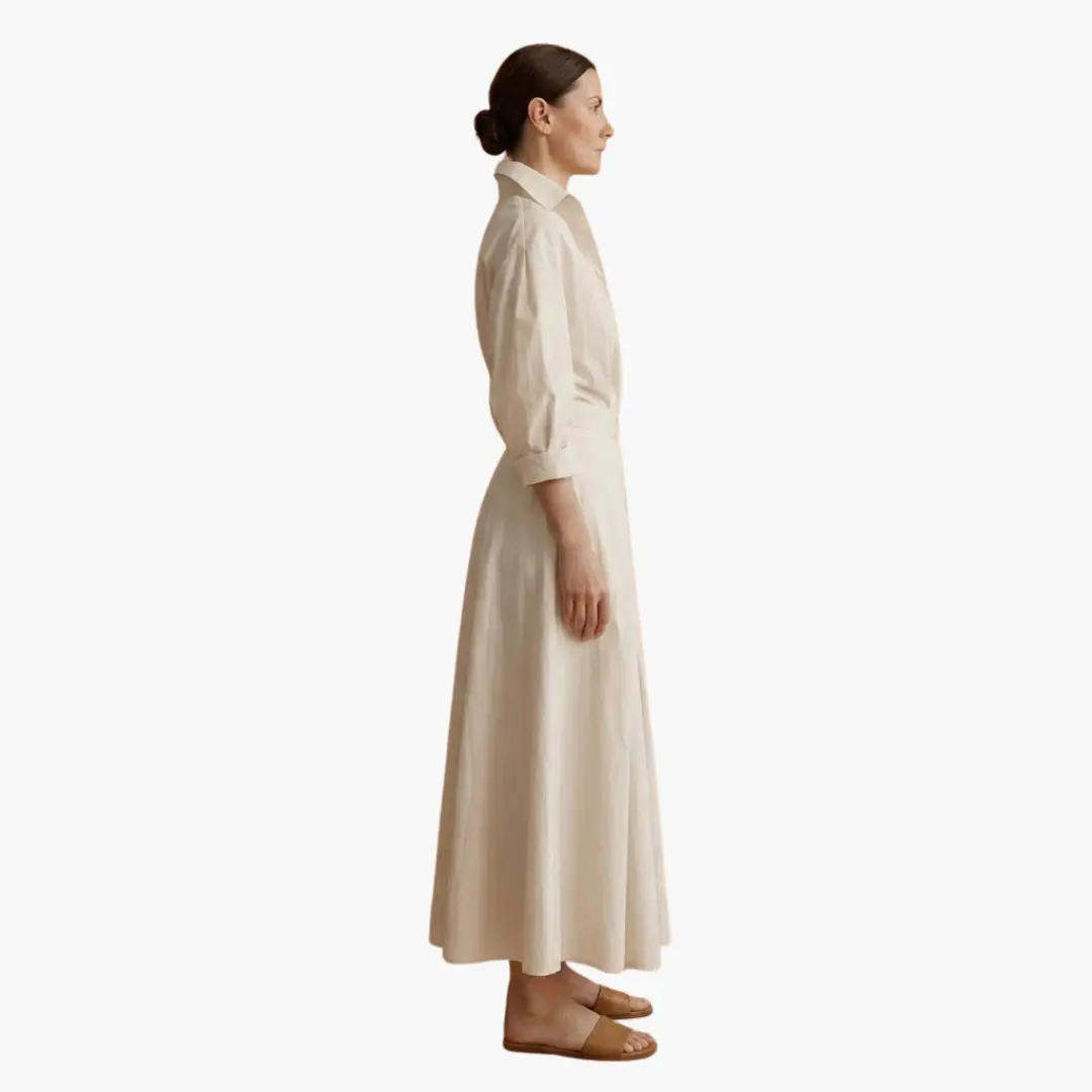Tailored women's shirt dress, button front and defined waist create a flattering, sophisticated silhouette.