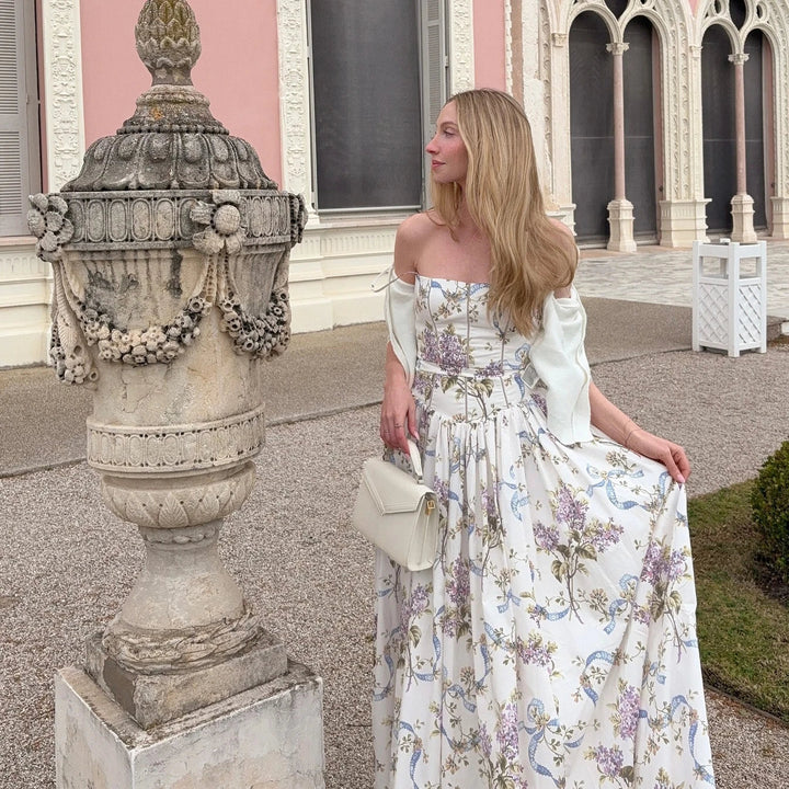 Chic women's strappy floral midi dress with corset detailing, suitable for prom & special occasions.