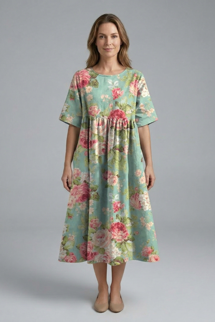 Comfortable women's floral midi dress featuring a round neck, short sleeves & a flattering flared skirt.