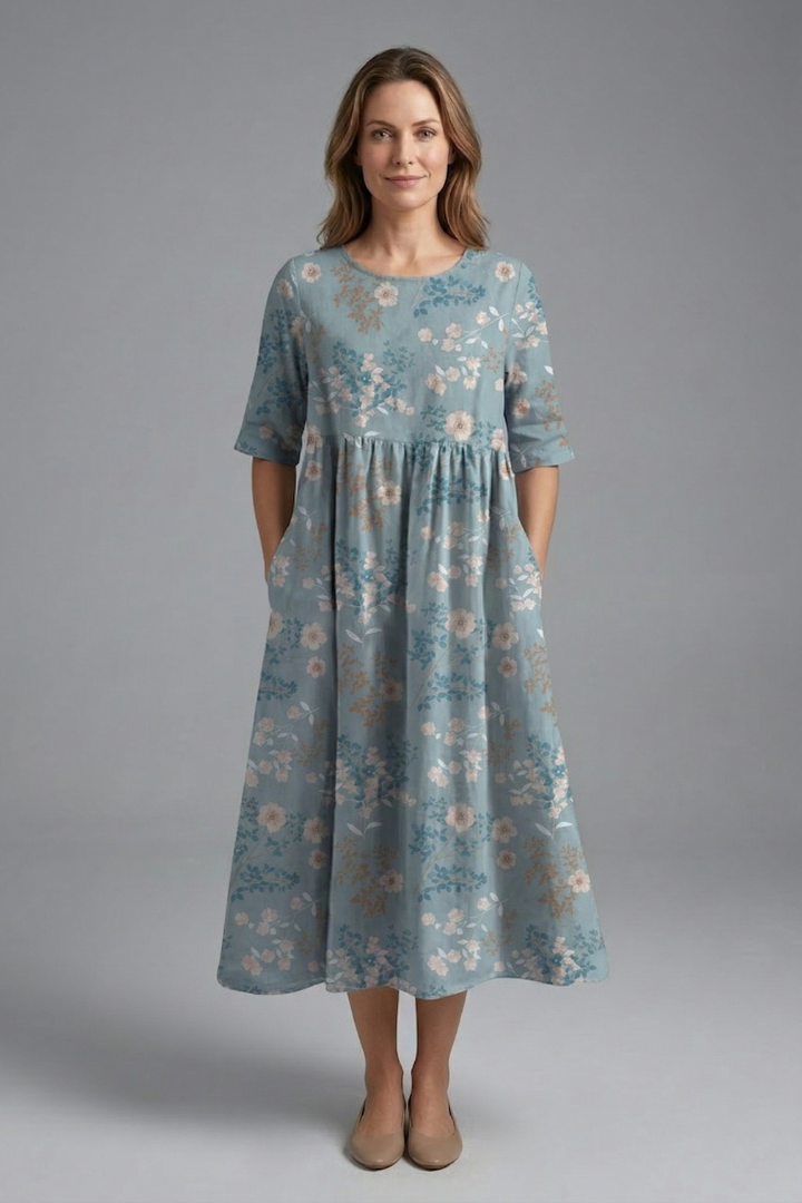 Casual yet elegant women's floral midi dress, perfect for everyday wear. Features round neck & short sleeves.