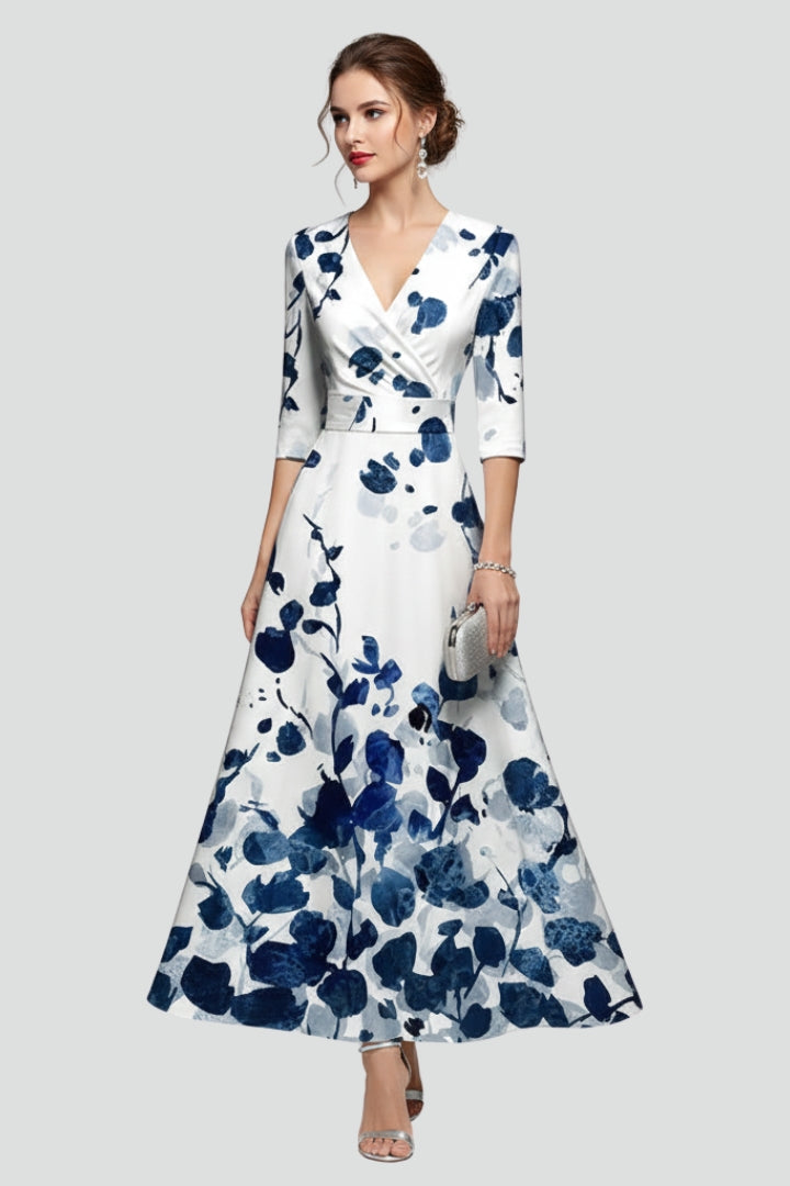 Stylish women's summer maxi dress, featuring a vibrant floral pattern, V-neckline, and comfortable midi sleeves.