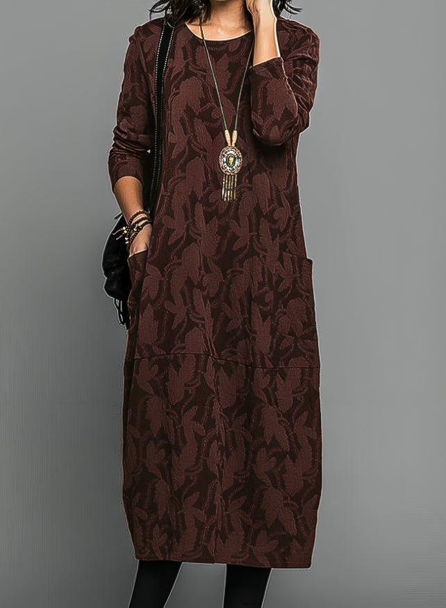 Sophisticated women's midi dress with vibrant print, perfect for weddings or receptions