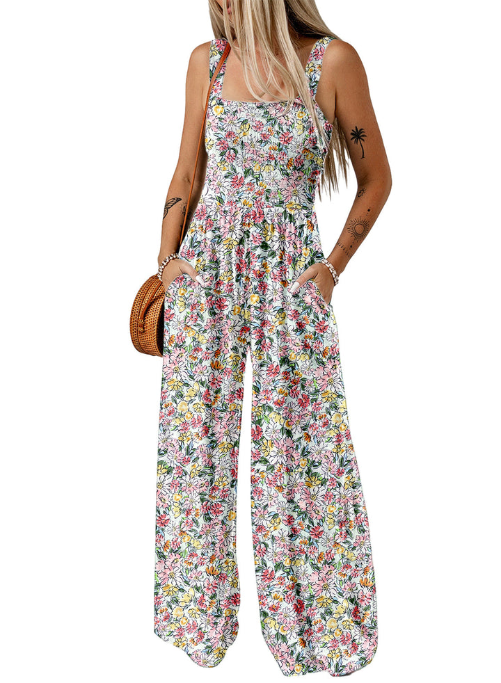 Elegant floral wide-leg jumpsuit styled for a daytime event, comfortable and chic.