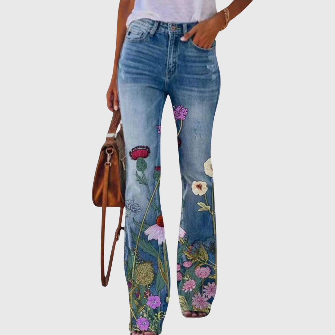 Stylish women's wide-leg pants with beautiful floral print & decorative buttons. Ideal for elegant casual fashion.