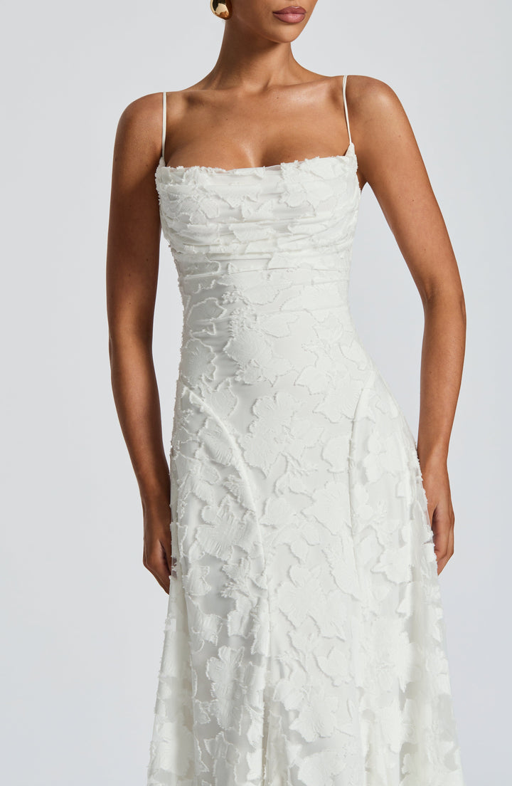 Graceful women's wedding guest maxi dress, an elegant flowy option for celebrations.