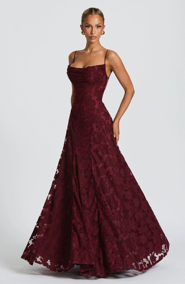 Stylish women's maxi dress with an elegant flowy silhouette, great for party wear.