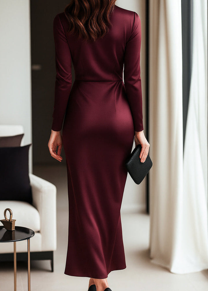 Stylish women's long sleeve wrap dress featuring a tie waist detail. Ideal elegant maxi dress for formal events & parties.
