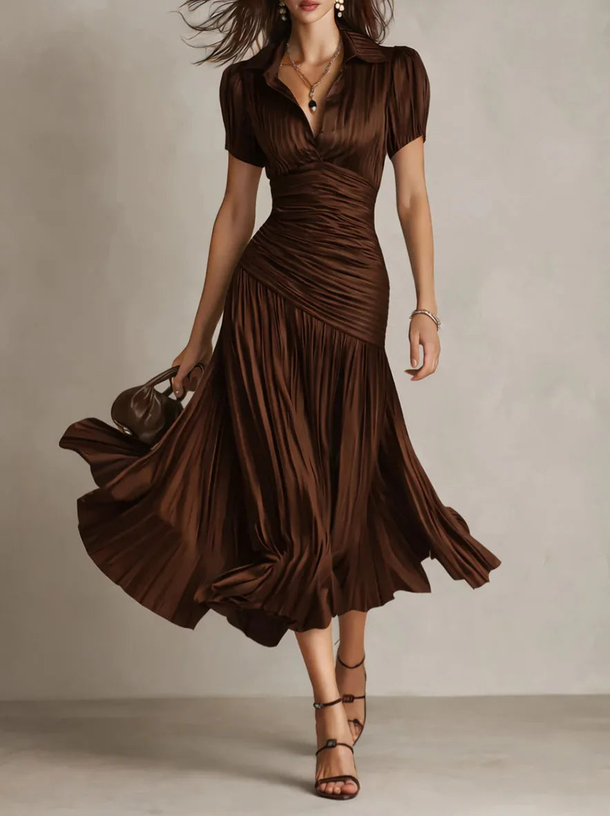 Front view of women's elegant pleated midi dress. Collared A-line design for a sophisticated look.
