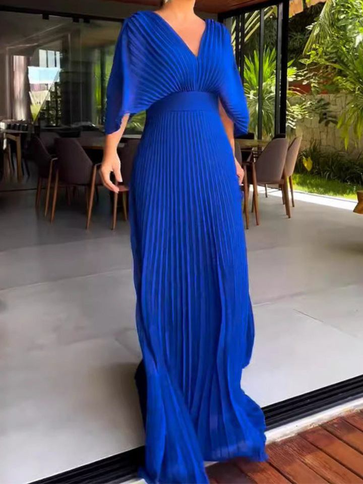 Chic pleated maxi dress with comfortable batwing sleeves & a flattering V-neck, suitable for parties.
