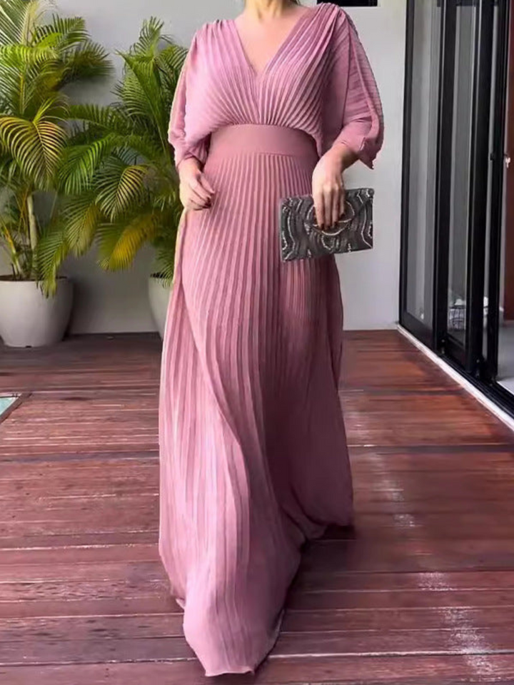 Spring/Summer women's pleated maxi dress with batwing sleeves, elegant for weddings or garden parties.