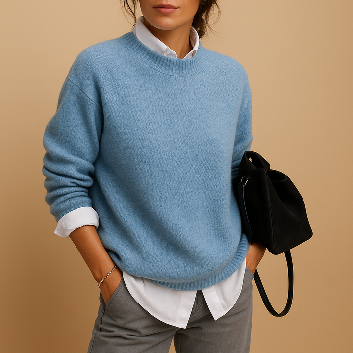 Versatile women's elegant pullover sweater in comfortable knit. Round neck, long sleeve, ideal for office or casual winter style.