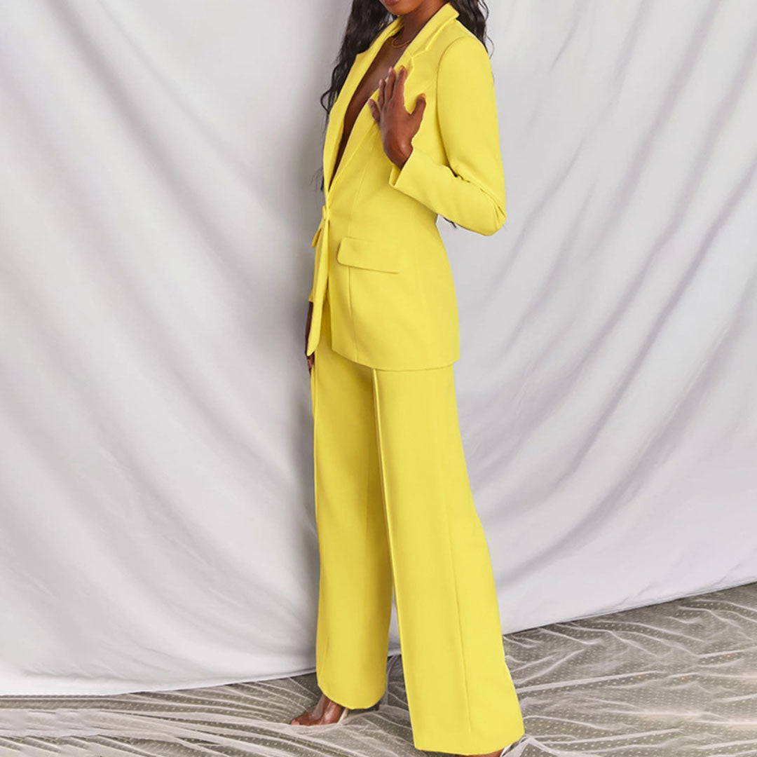 Women's elegant tailored blazer & pants set in chic design, perfect for professional business attire.