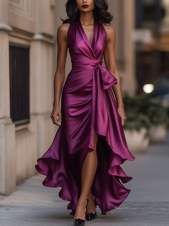 Women's elegant sleeveless wrap midi dress with a V-neck, a timeless summer party outfit.