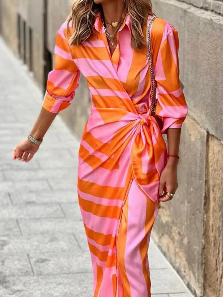 Women's elegant wrap front midi dress with tie waist, V-neck, & 3/4 sleeves. Perfect for spring/summer fashion.