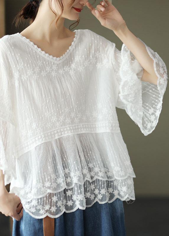 Chic women's top with intricate floral embroidery, scoop neck, tiered lace details, and stylish half sleeves for casual wear.