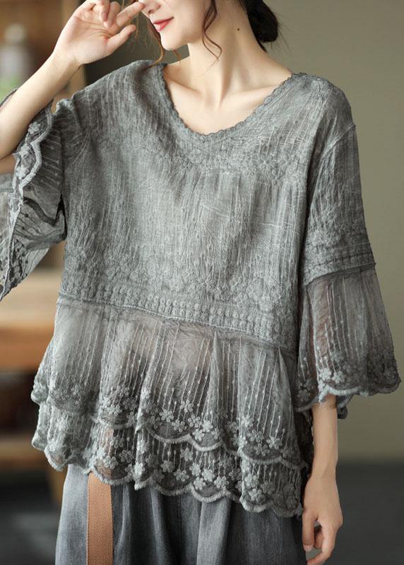 Summer fashion: Women's embroidered blouse with a stunning tiered lace hem, floral design, and comfortable half sleeves.