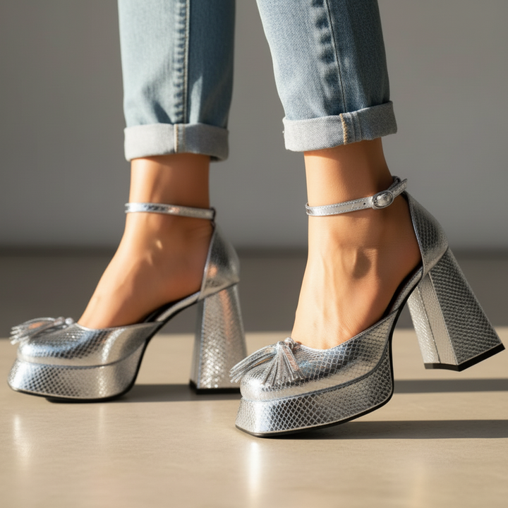 Fashionable women's midnight heels, exotic design with tassel accent, perfect for evening wear.