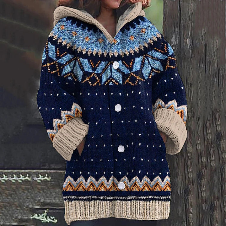 Close-up of a Fair Isle patterned hooded cardigan for women, showcasing intricate knit details and soft fabric.