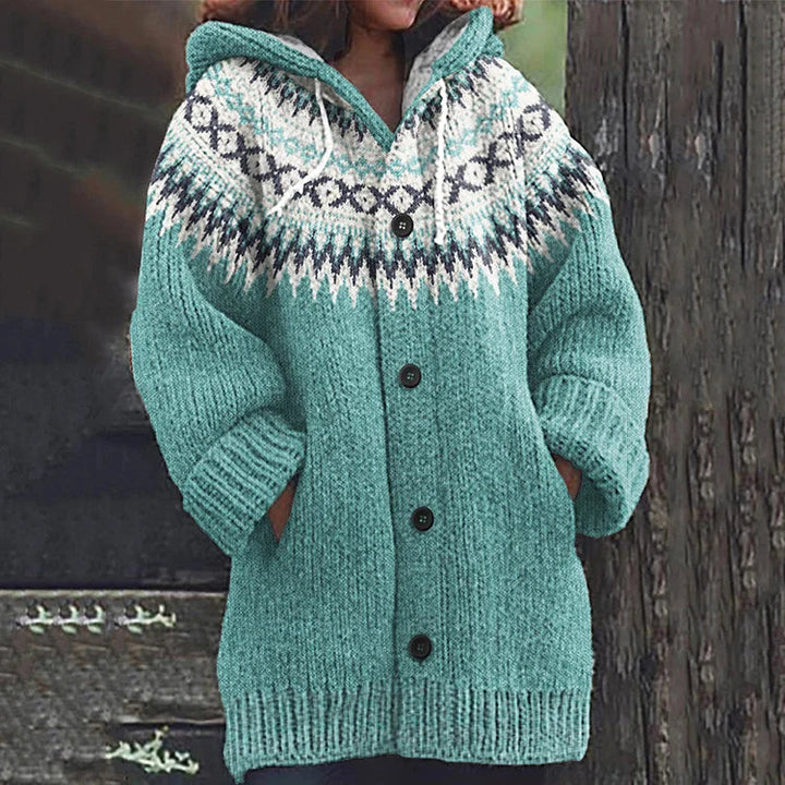 Back view of a women's hooded knit Fair Isle cardigan, highlighting the detailed pattern and warmth for casual wear.
