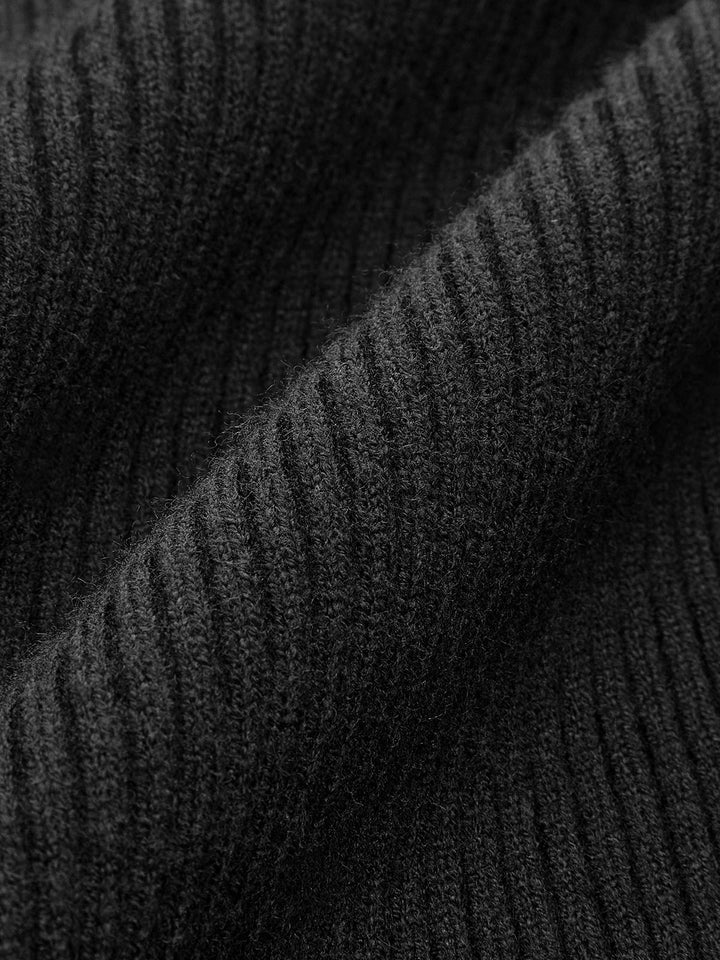 Close-up of the ribbed pattern on a women's long sleeve turtleneck sweater, textured and comfortable knit.