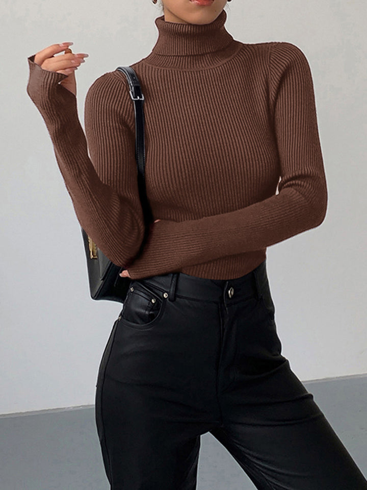 Stylish women's ribbed knit turtleneck sweater, a perfect blend of casual comfort and elegant spring fashion.