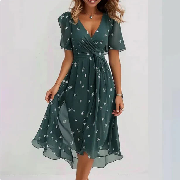 Bohemian style floral midi wrap dress for women, featuring a flattering V-neck and puff sleeves. Casual chic.