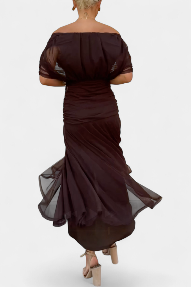 Chic women's floral off-shoulder evening gown with elegant ruched details & flowing maxi skirt.