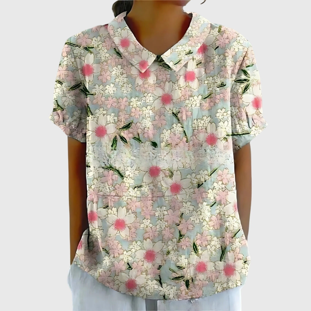 Elegant floral print short sleeve blouse with collar. Casual yet chic women's summer top.