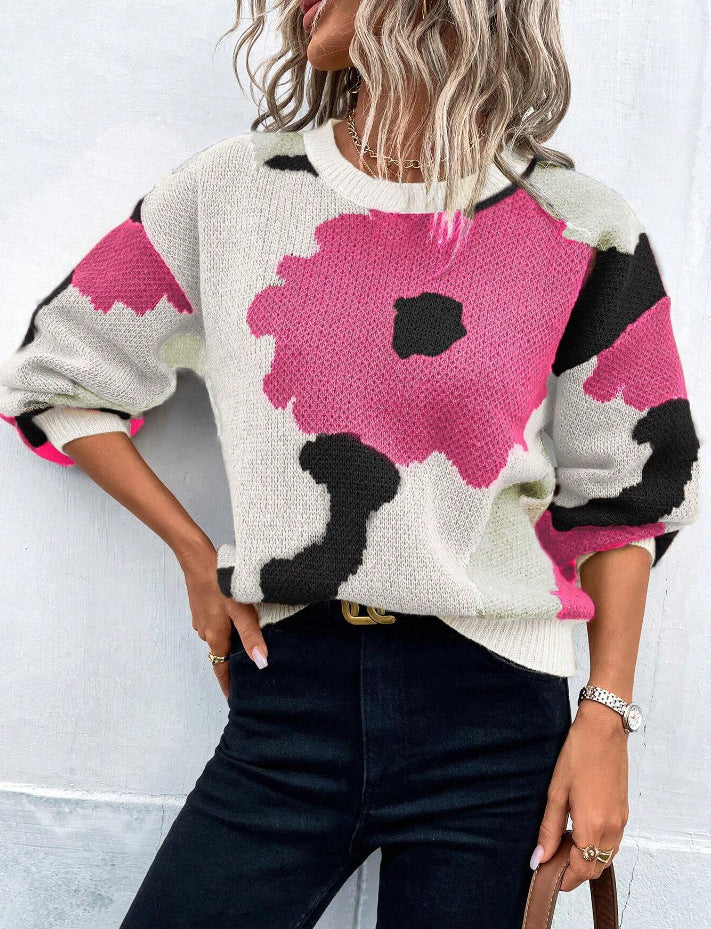 Stylish women's pullover sweater featuring an elegant floral print, great for everyday wear.