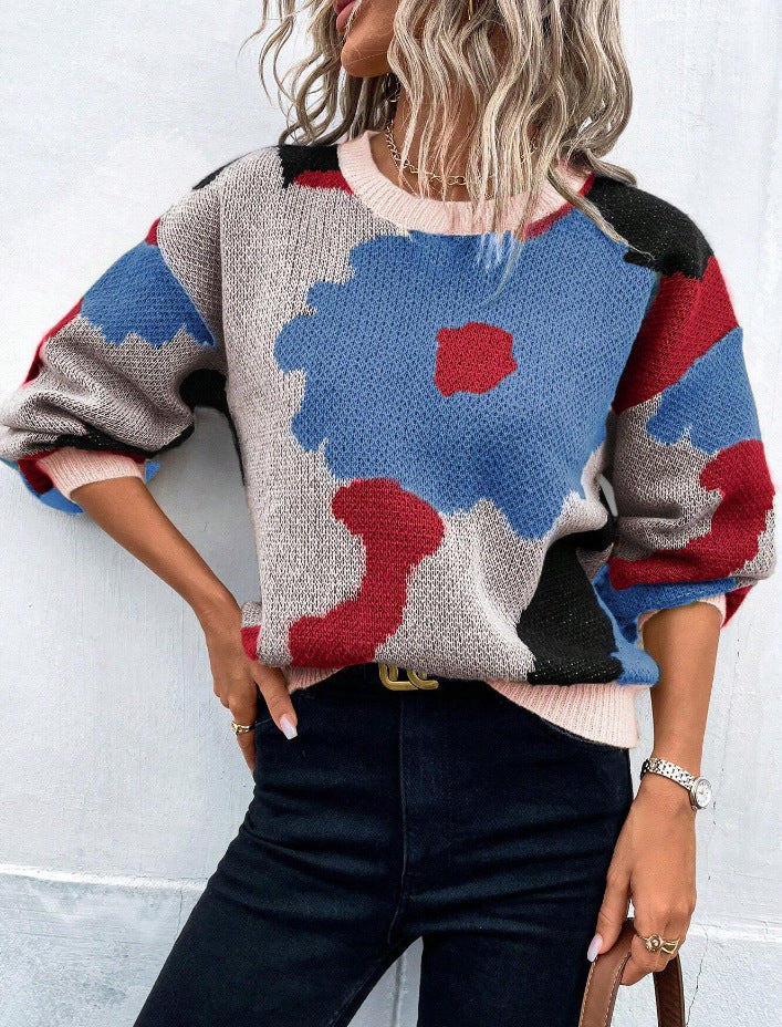 Full view of a women's floral print long sleeve pullover sweater, a cozy winter fashion choice.