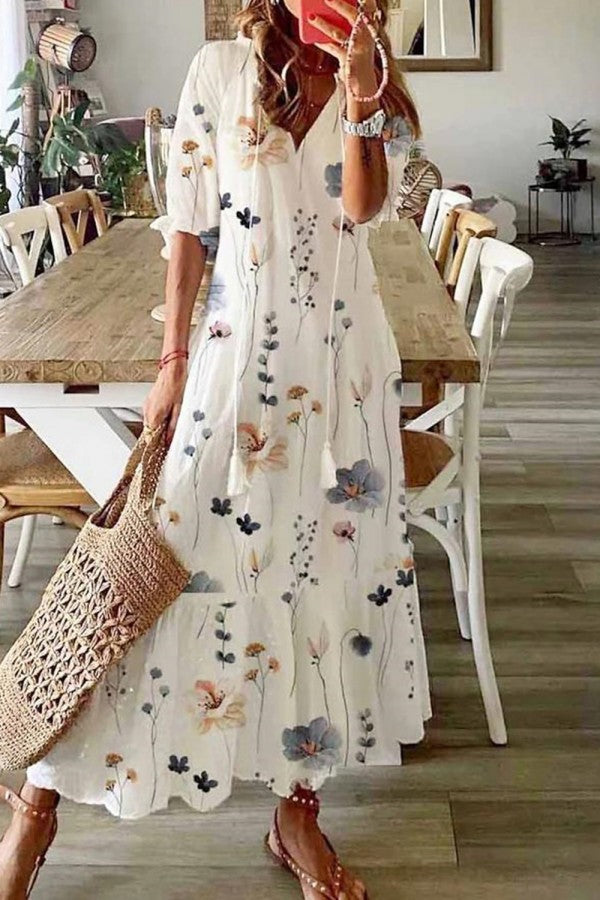Women's floral print maxi dress with tassel V-neck, short sleeves, perfect for summer casual or beach wear.
