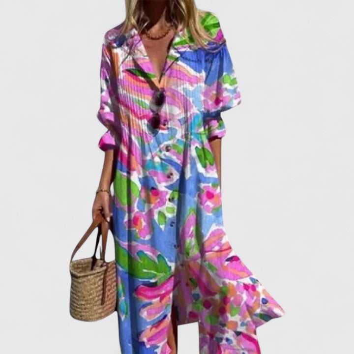 Vibrant floral print midi dress for women, with elegant pintuck pleats, a collar, and practical half sleeves.