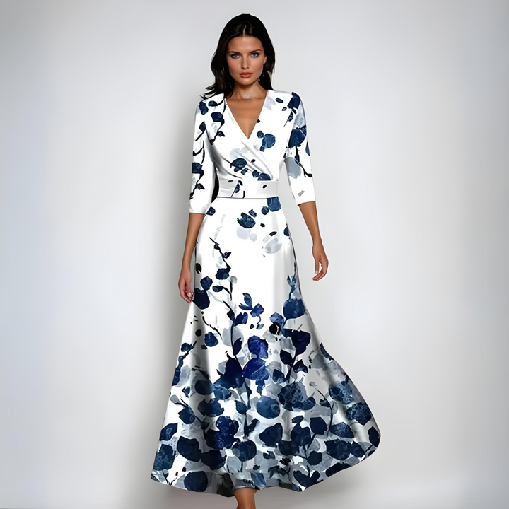 Elegant women's floral wrap maxi dress featuring a flowing A-line skirt and comfortable 3/4 sleeves, ideal for parties.