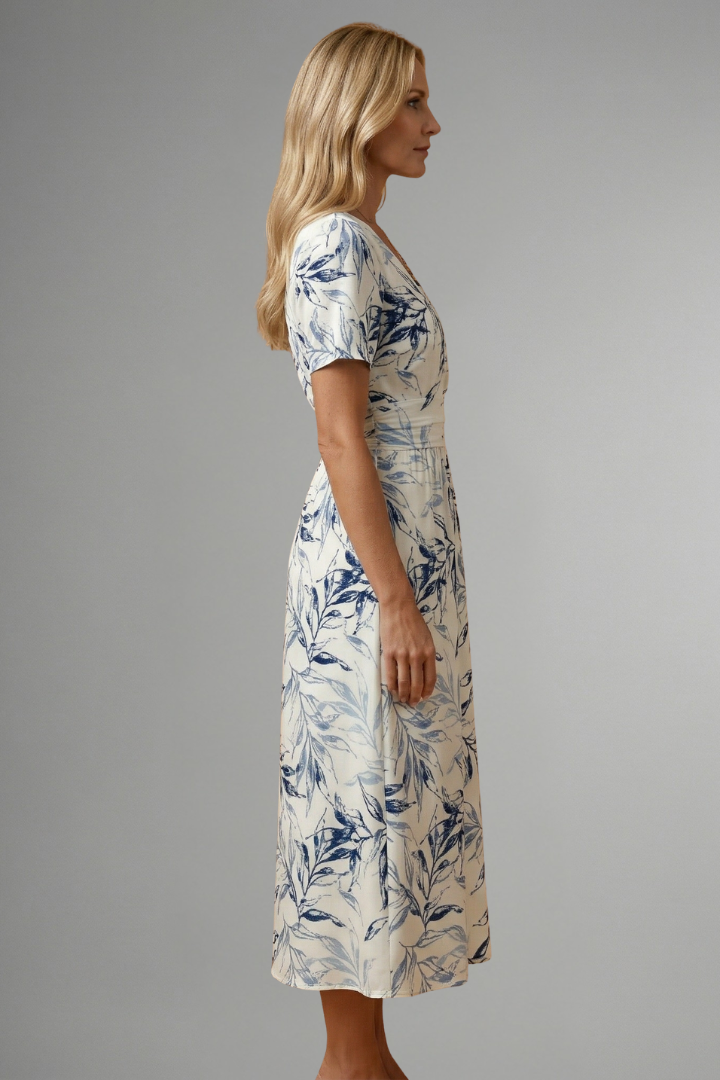 Versatile women's floral V-neck midi dress. A-line silhouette, short sleeves. Great for spring/summer casual.