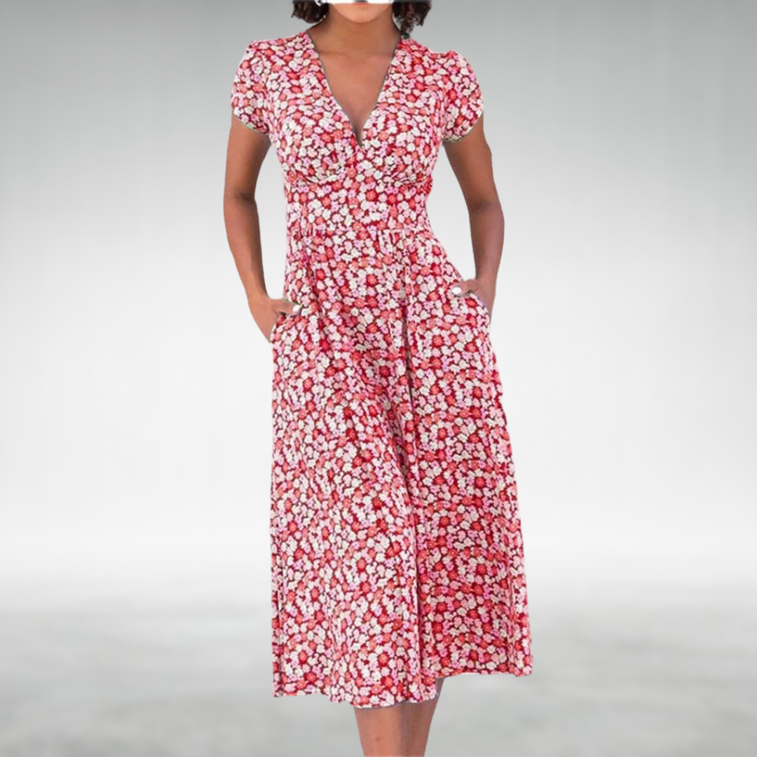 Comfortable women's midi dress featuring a vibrant floral print and practical pockets.