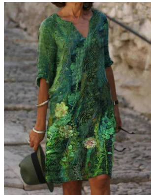Women's floral V-neck midi dress with short sleeves, perfect for a casual summer look.