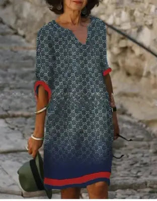 Versatile women's floral midi dress with a V-neck, suitable for both casual and elegant events.