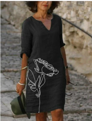 Elegant women's midi dress featuring a vibrant floral print and a flattering V-neckline.