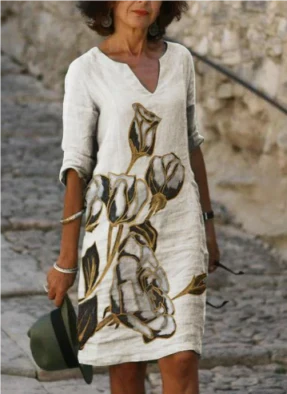 Artistic floral print midi dress for women, designed with a stylish V-neck. Ideal for summer.