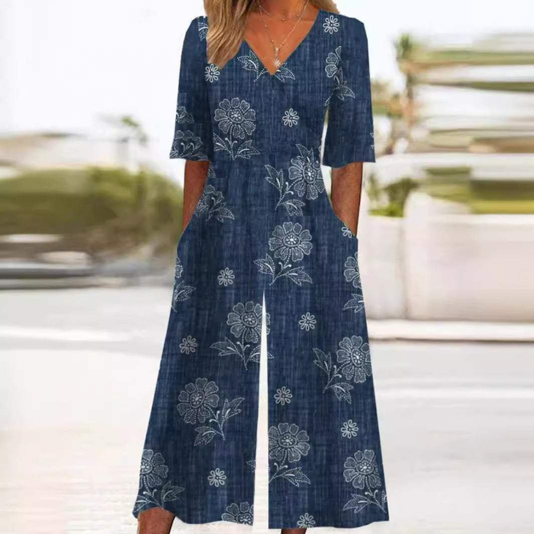Women's floral wide leg jumpsuit with V-neck & elbow sleeves, perfect for bohemian style.