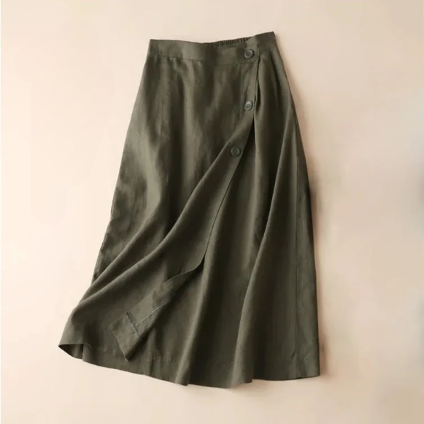 Full view of a women's flowy A-line midi skirt, highlighting its elegant drape and comfortable summer style.