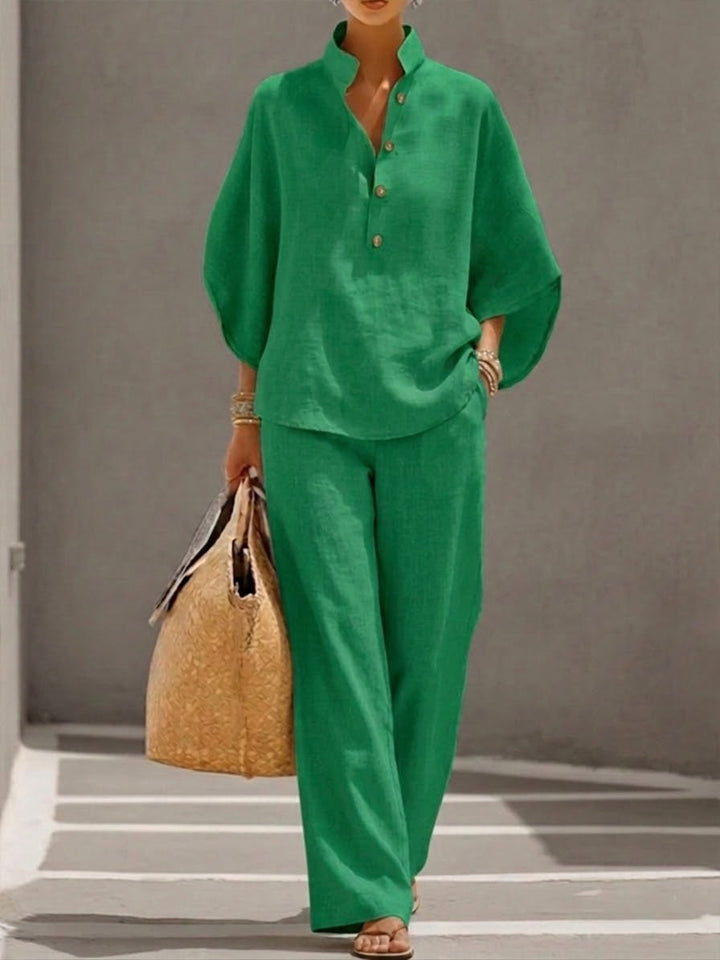 Casual women's flowy batwing top with wide leg pants. Comfortable and stylish coordinating outfit.