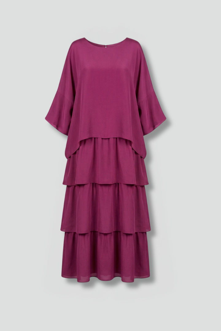 Women's flowy tiered maxi dress with a round neck, perfect for casual summer elegance.
