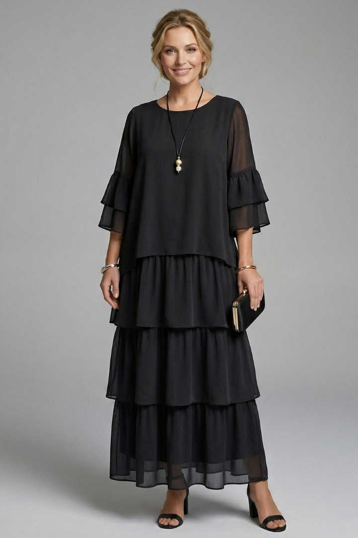 Chic women's tiered maxi dress, flowy and comfortable, with a round neck for elegant summer fashion.