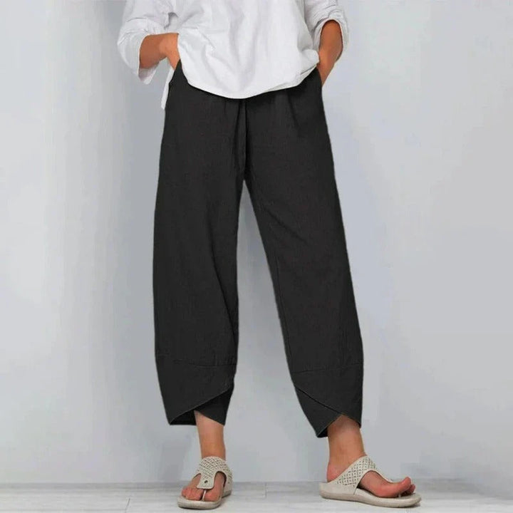 Model wearing comfortable women's wide leg cropped pants, showing their flowy design and casual summer style.